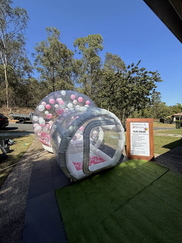 Clear bubble igloo with balloons floating inside