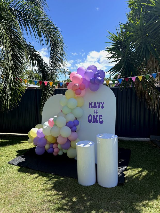 Balloon garland on a styled backdrop